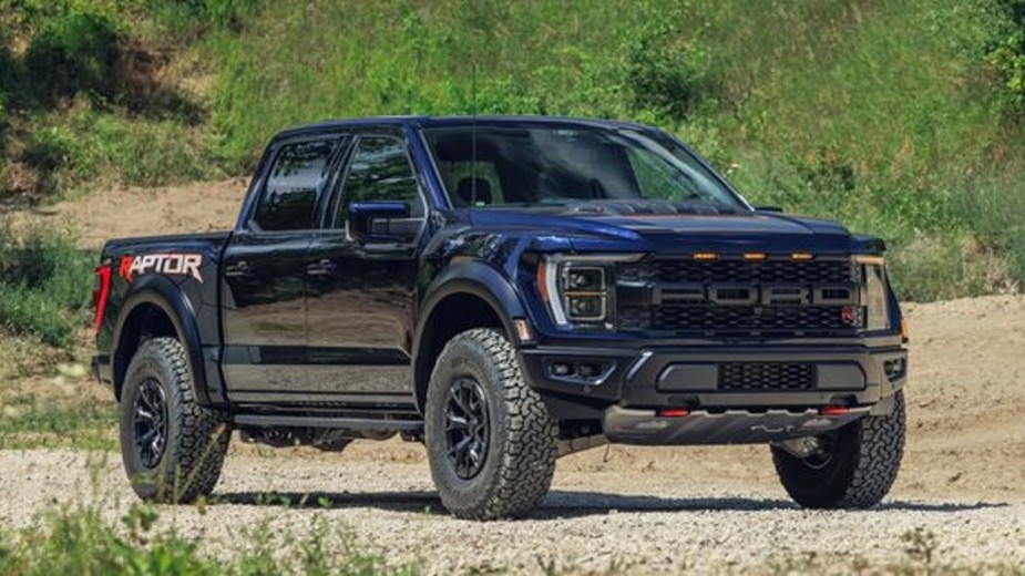 The blue 2023 Ford F-150 Raptor R is on the trail