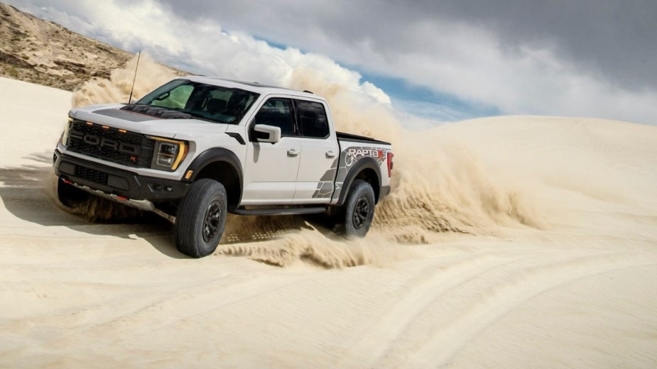 White 2023 Ford F-150 Raptor R on the dunes