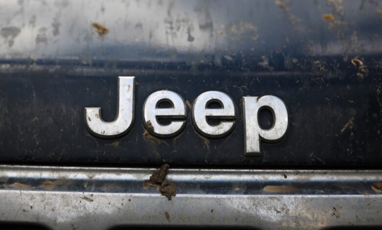 Jeep name logo on a black car.