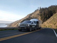 How does the new 2024 GMC Sierra EV Denali stack up against other electric trucks?