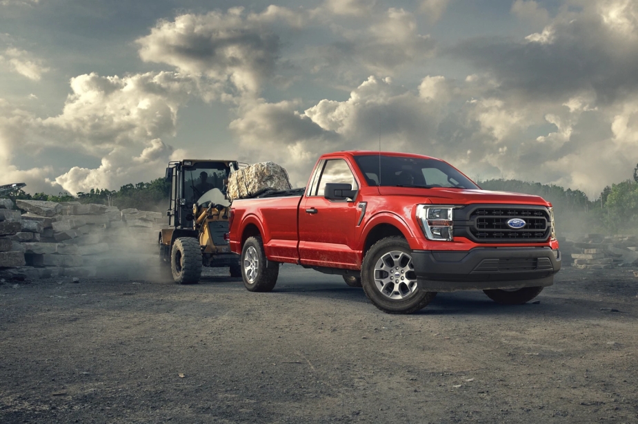 2023 Ford F-150 work truck with rubble loaded in the bottom of it.
