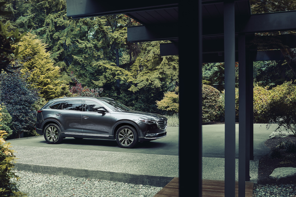 A silver 2023 Mazda CX-9 in an outdoor setting.