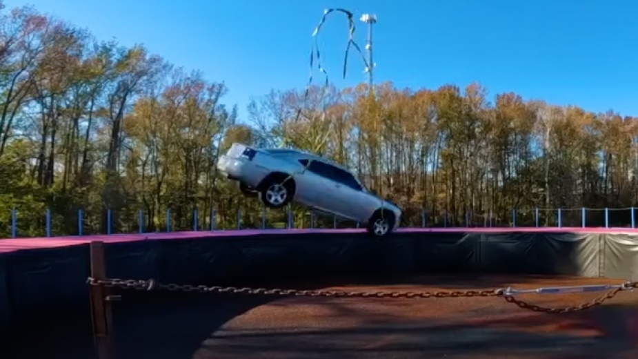 A Dodge Charger fell 500 feet by helicopter into Orbeez Pond in MrBeast's Facebook video