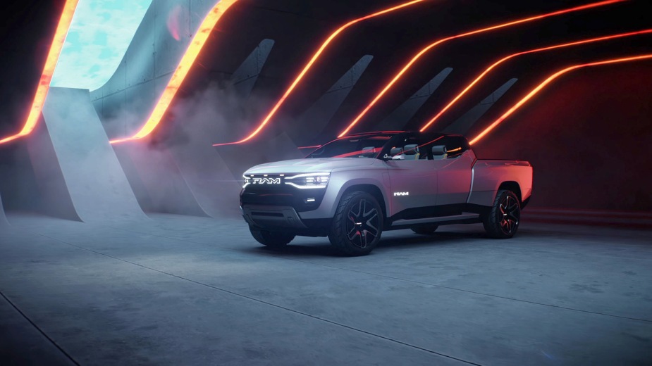 Promotional photo of the Ram Revolution concept truck parked in a concrete structure, the sky visible through the window.