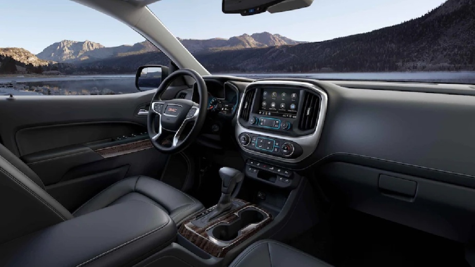 The dashboard and front seats of the 2022 GMC Canyon pickup truck, GMC's most affordable new pickup