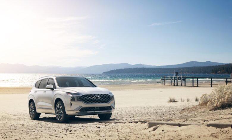 The best Hyundai SUVs for 2023 include the Santa Fe photographed on the beach