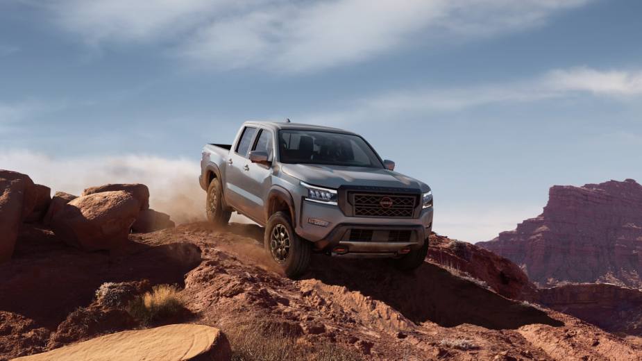 The 2023 Nissan Frontier midsize truck is off-road.