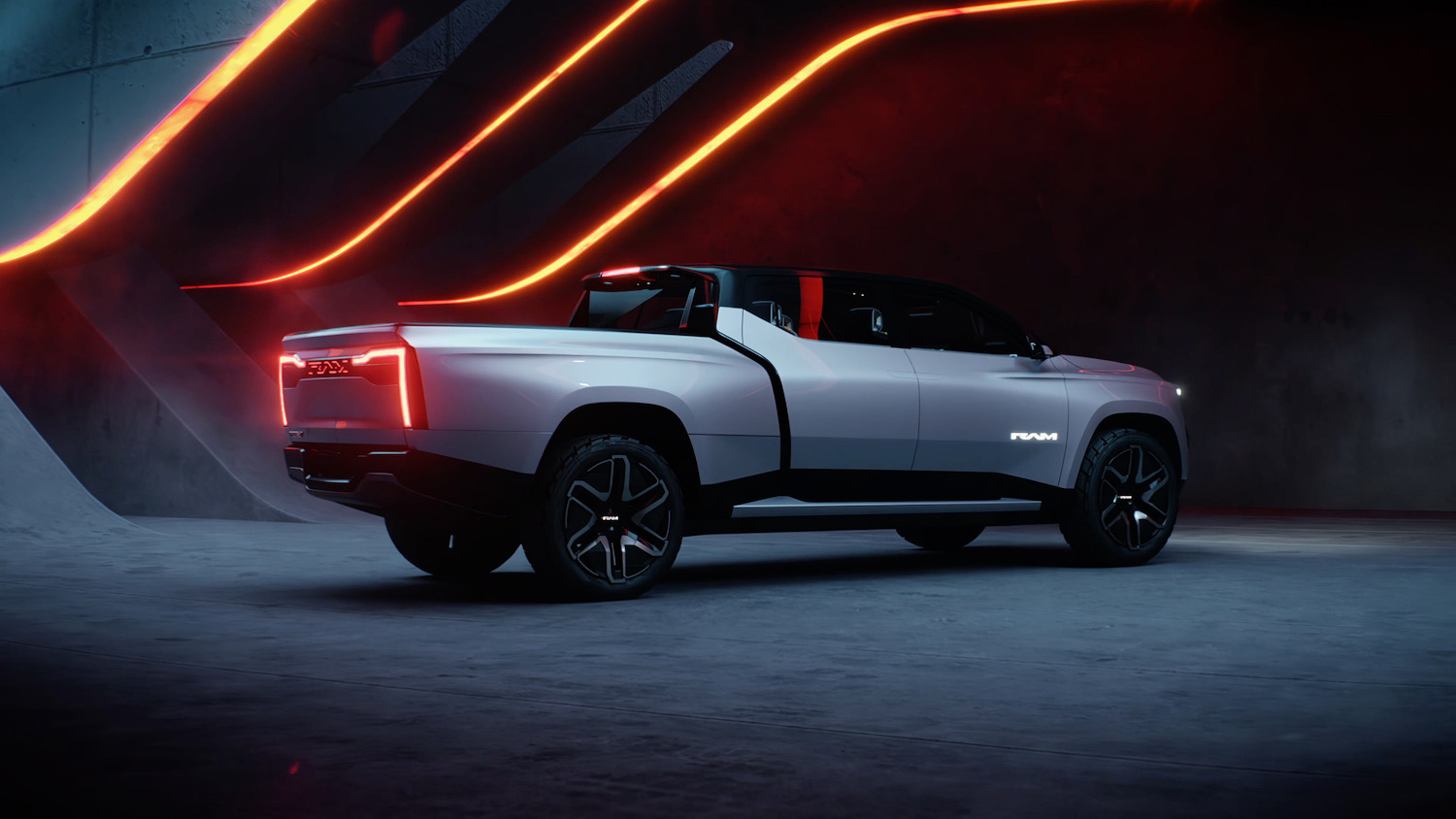 Promo for a 2024 Ram 1500 Revolution electric pickup that may offer significantly more ground clearance than the current 2500 Power Wagon