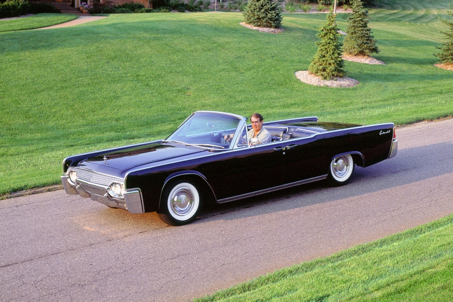 A black Lincoln Continental, the iconic land yacht before we had big trucks.