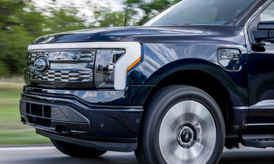 The dark blue Ford F-150 Lightning is one of the least reliable American car brands.