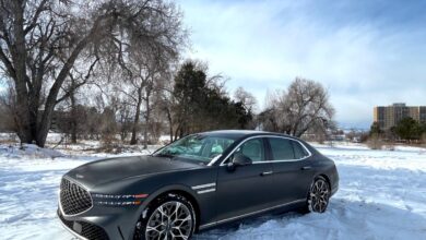 2023 Genesis G90 front view in the snow