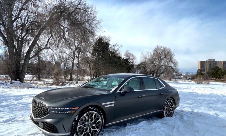 2023 Genesis G90 front view in the snow