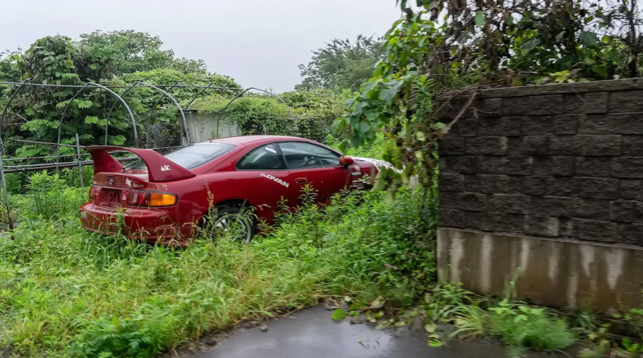 A red Mk4 Toyota Supra was abandoned in Fukushima