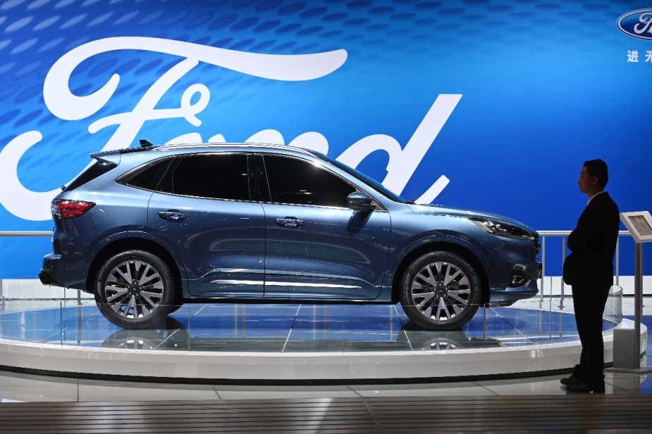A blue 2019 Ford Escape is displayed at an auto show. 