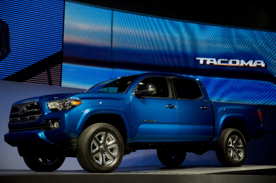 The 2015 Toyota Tacoma midsize pickup is shown.  It can be found used for around $20,000.
