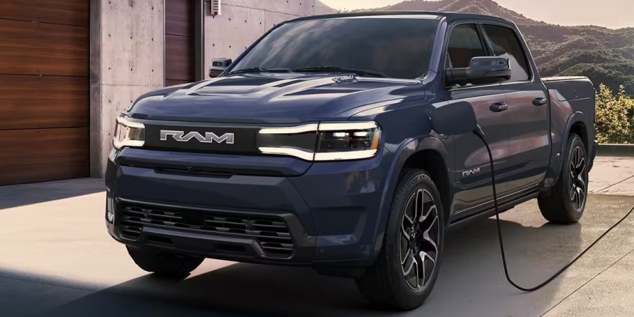 A blue 2025 Ram 1500 REV electric pickup truck is shipping. 
