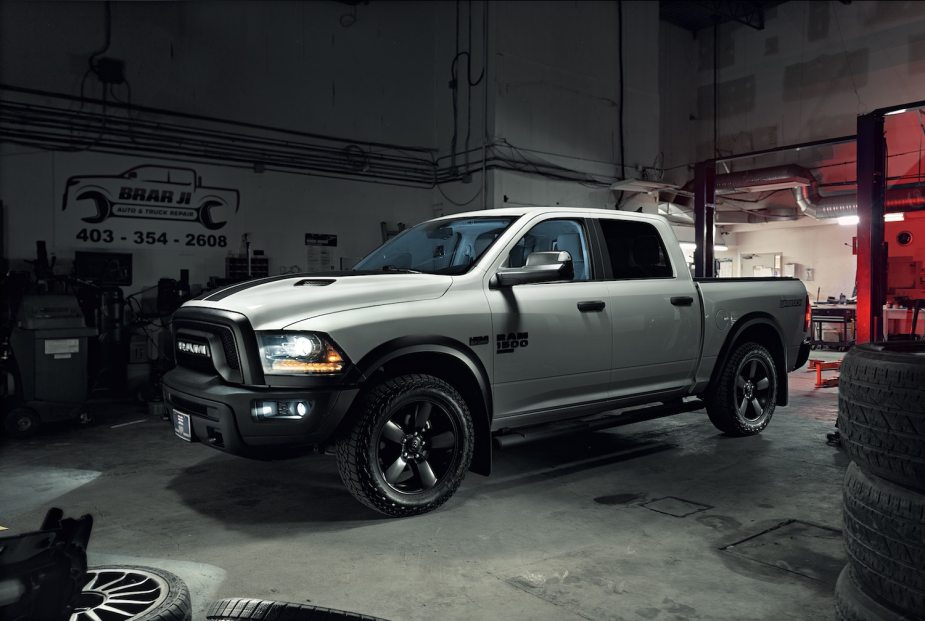 A fourth-generation Ram 1500 pickup truck parked in a garage to fix common, costly issues.