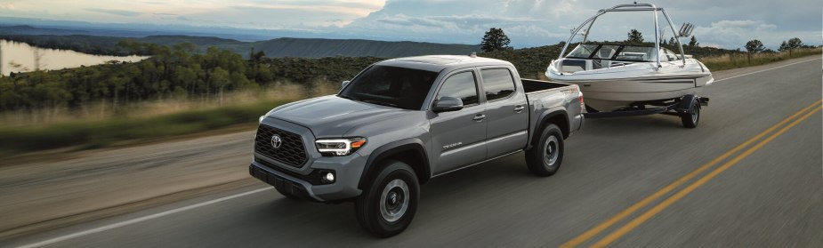 2023 Toyota Tacoma towing a boat