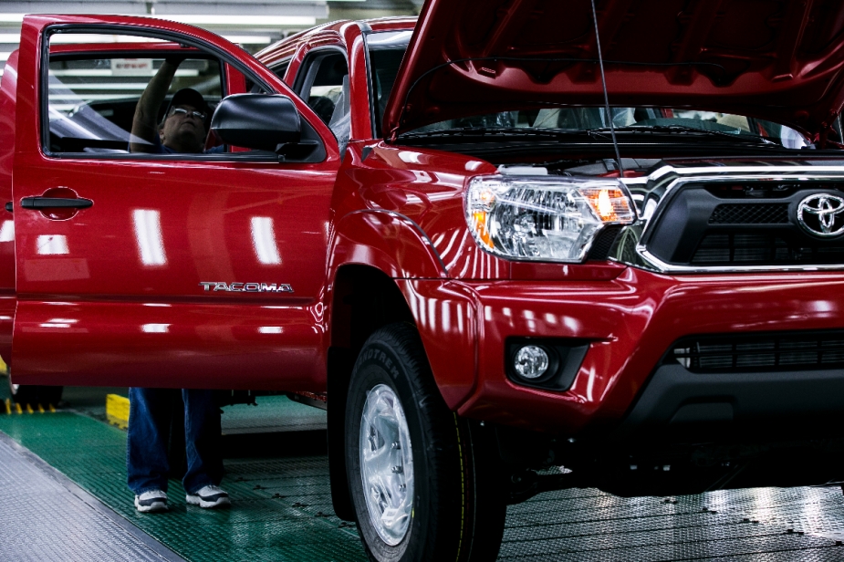 A red 2013 Tacoma on the assembly line. 
