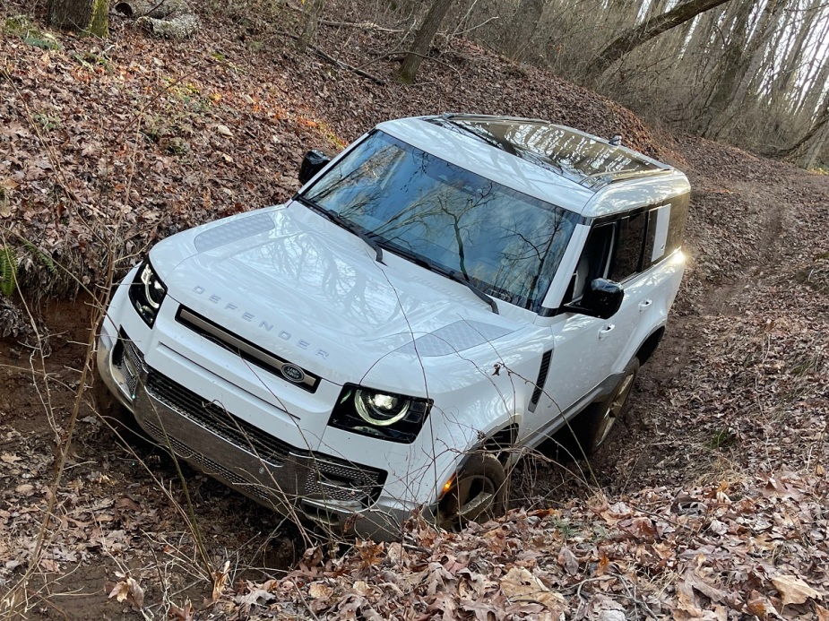 2023 Land Rover Defender 130 off road in mud