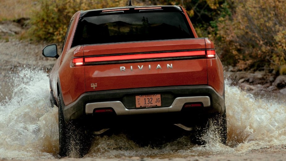 Rear view of the 2023 Rivian R1T EV, showing how the IIHS named it the safest midsize pickup, not Toyota or Ford 