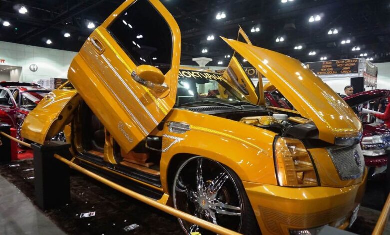 A Cadillac Escalade EXT luxury pickup truck model on display at DUB Show 2015 in Los Angeles, California
