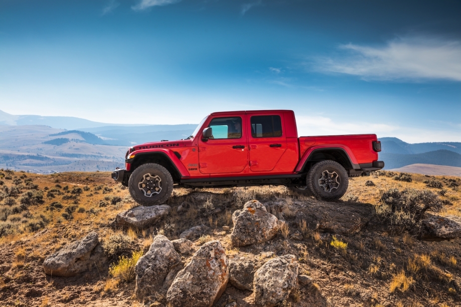 Red 2023 Jeep Gladiator parked outdoors.