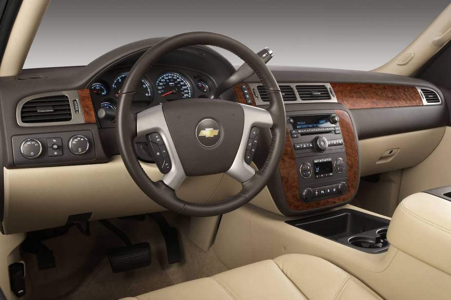 The leather and wood interior of the 2010 Chevrolet Silverado.