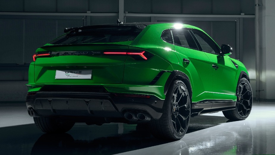 Rear view of the green Lamborghini Urus 2023, the new most affordable Lamborghini car in 2023 and one of the fastest SUVs