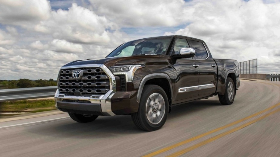 A brown 2023 Toyota Tundra full-size truck is on the road, and currently facing a recall.