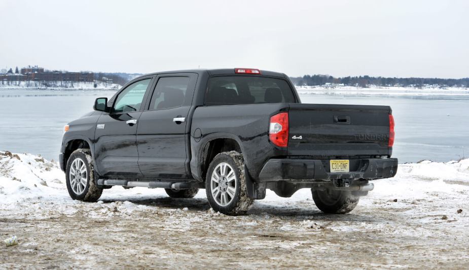 2014 Toyota Tundra sitting in front of a lake.