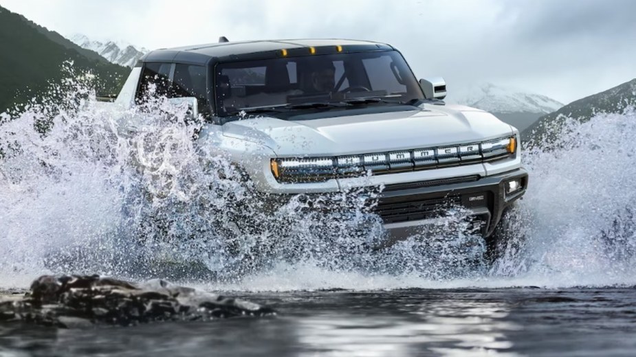 2022 GMC Hummer EV splashing in water