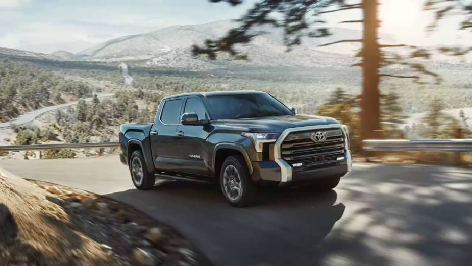 Toyota Tundra 2023 drives on a mountain road.