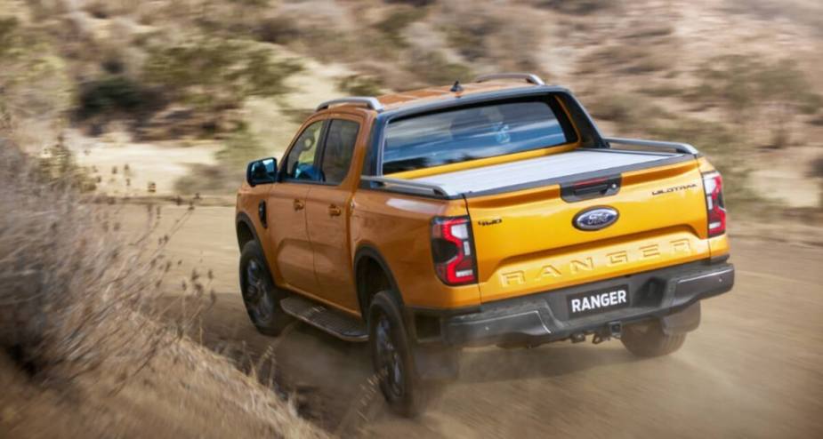 The 2024 Ford Ranger shows off its four-wheel drive capability as a mid-size truck.